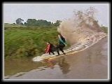 Bore Gurus Dave Lawson and Steve King riding the Bore at Weir Green